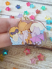 Rock P o k e 1 / 2in Acrylic Charm