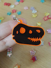 Dinosaur / TRex Head Skeleton 2in Orange UV Acrylic Charm