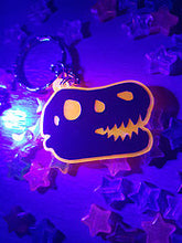Load image into Gallery viewer, Dinosaur / TRex Head Skeleton 2in Orange UV Acrylic Charm

